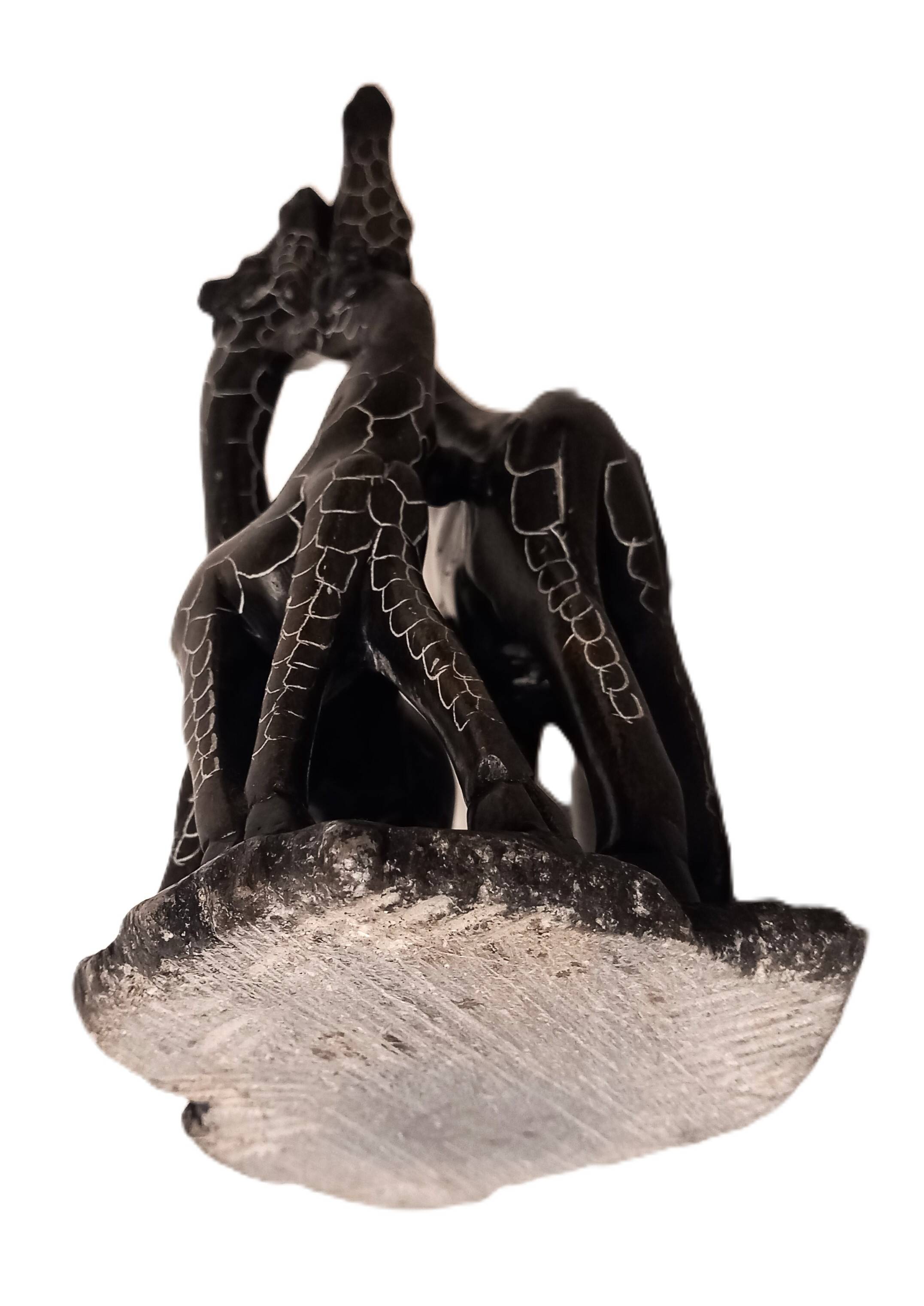 African stone sculpture of 3 Giraffes