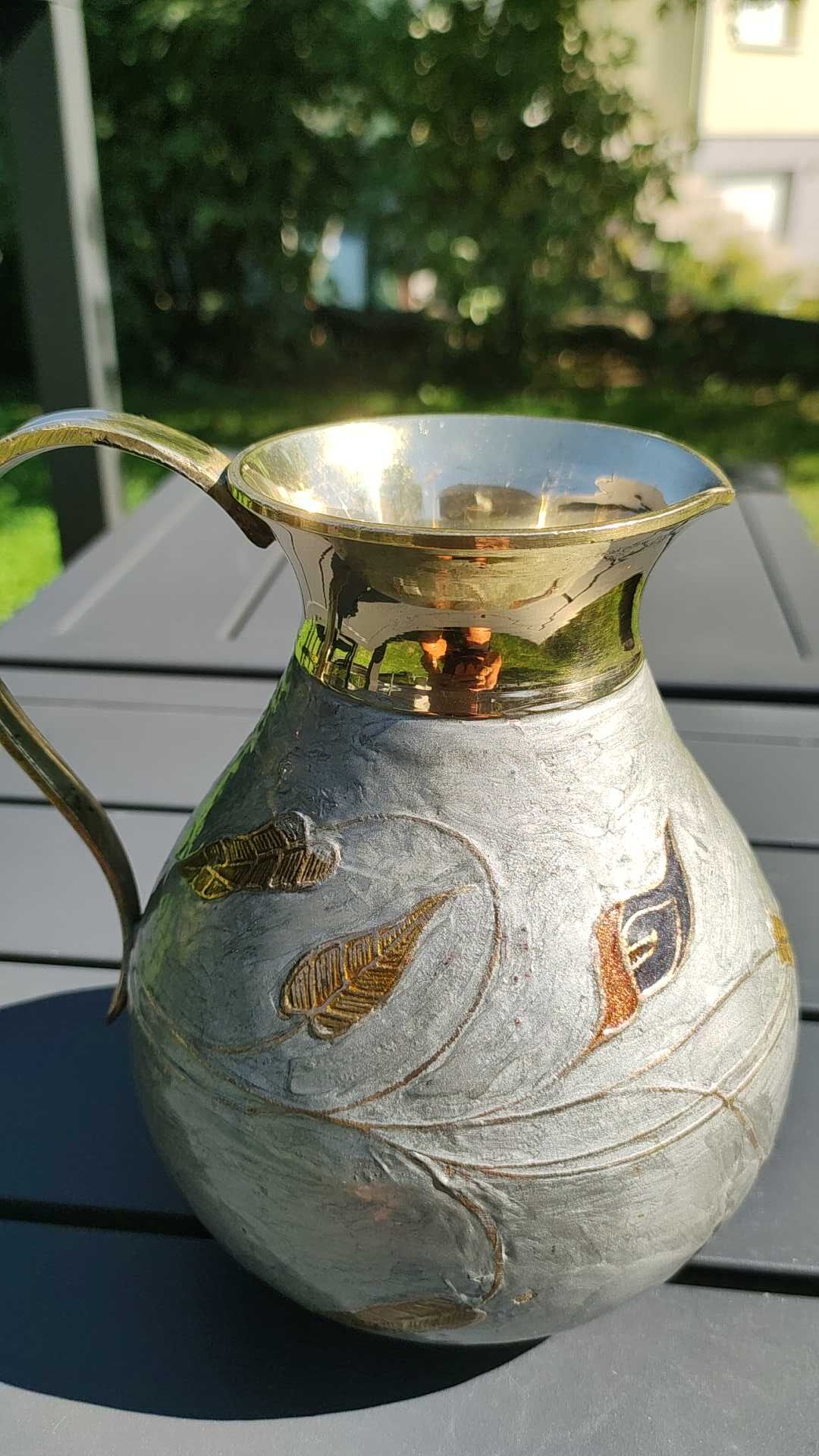 Decorative decanter in solid enamelled brass