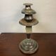 Pair of art deco style candle holders in silver metal