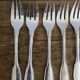 Set of 12 fish forks & 12 knives in silver metal