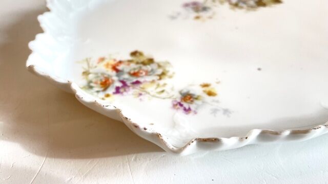 Old tray in floral pattern biscuit