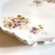 Old tray in floral pattern biscuit
