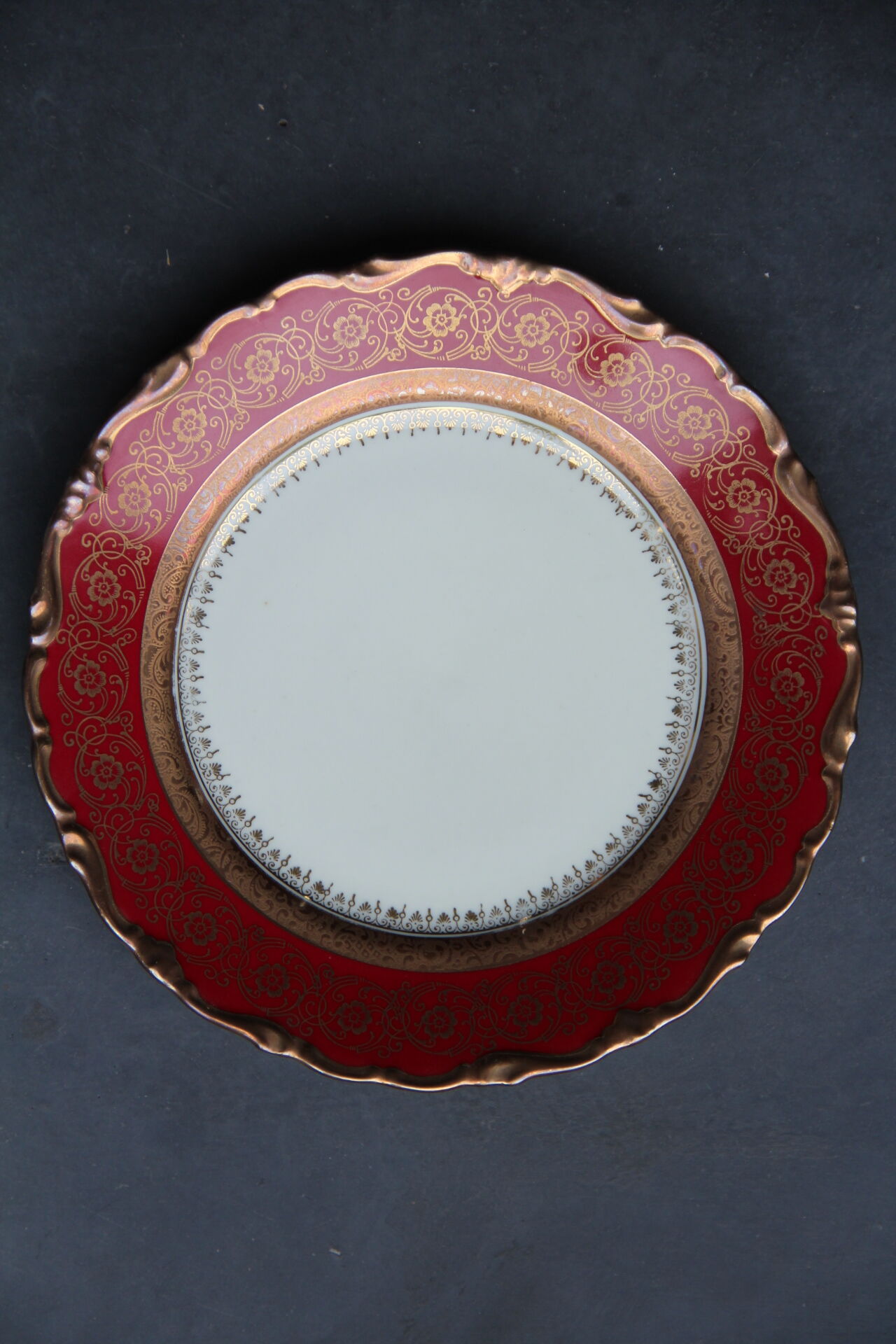 Bavarian porcelain dessert plate, garnet and gold floral rinses