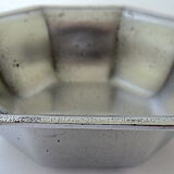 Empty octagonal pocket in tin by the workshop "Les Etains de France"