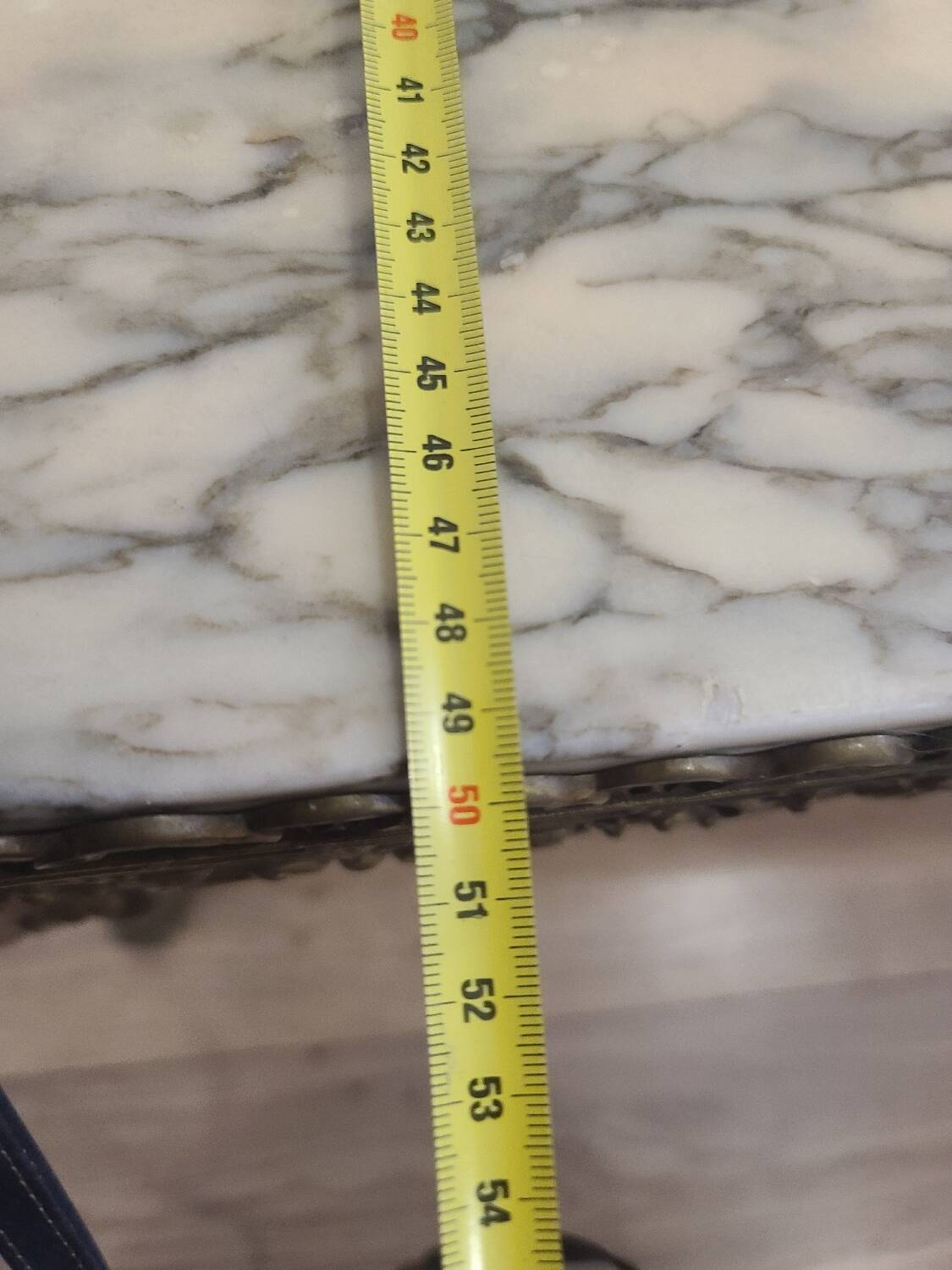 Marble coffee table with brass legs
