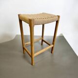 Solid wood stool with hand-woven seat