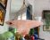 Art Deco basin suspension with pink glass and fabric cords.