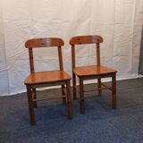 pair of solid pine chairs by Rainer Daumiller