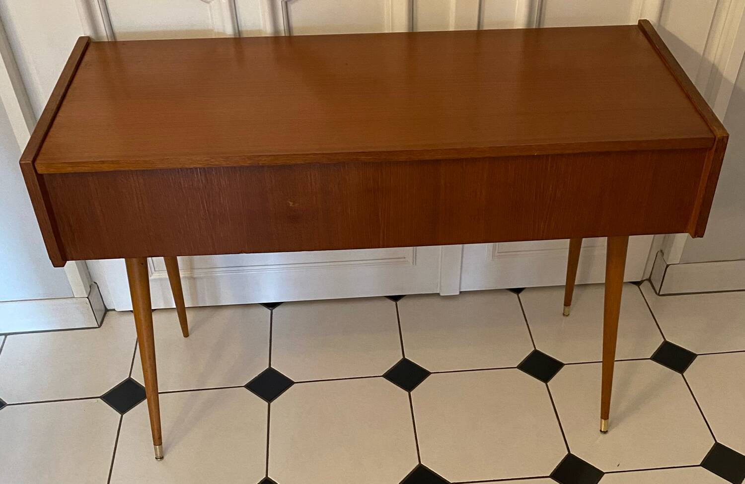 Vintage console with compass feet