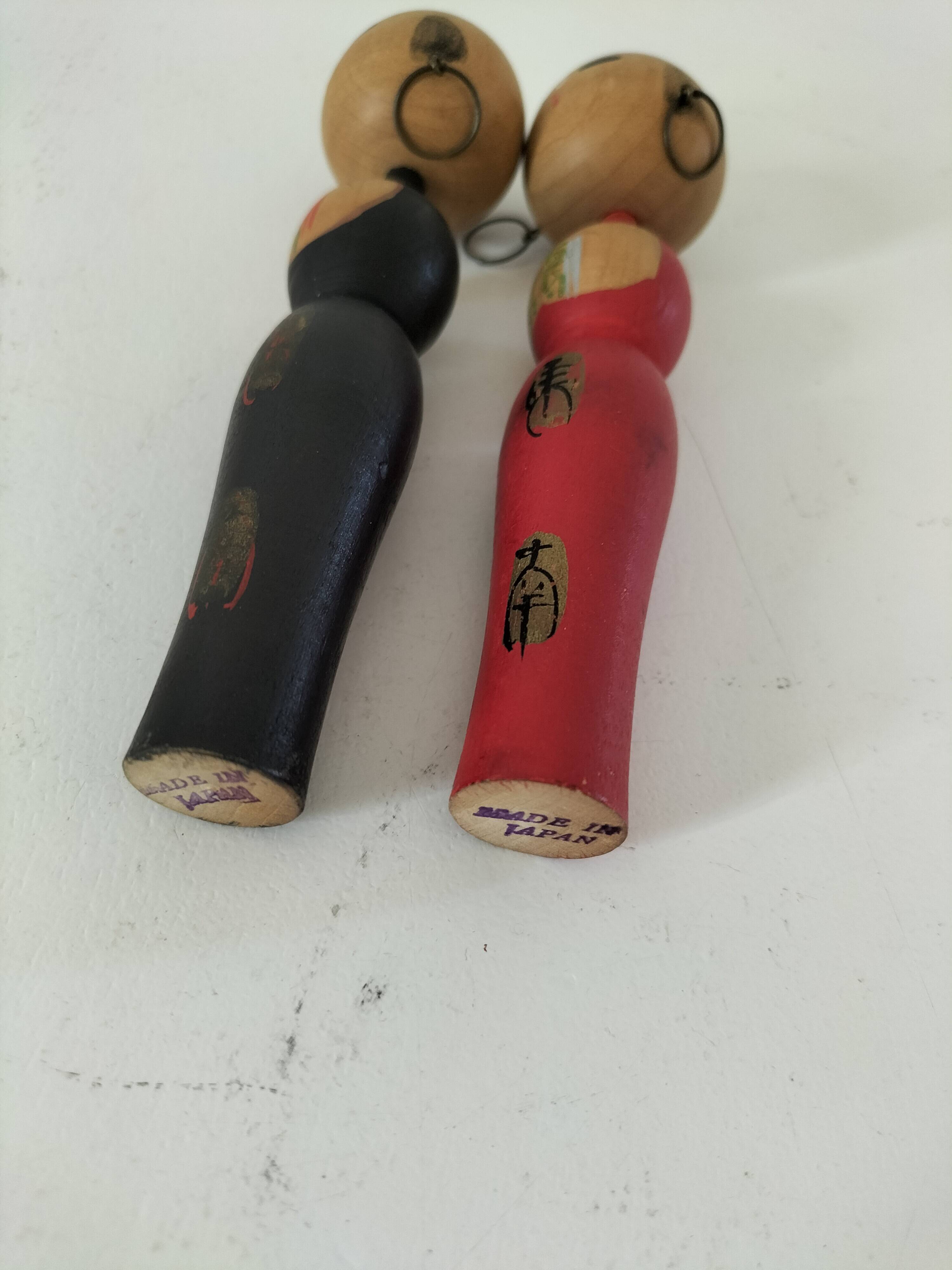 Pair of Japanese Kokeshi dolls - 1950s-1970s