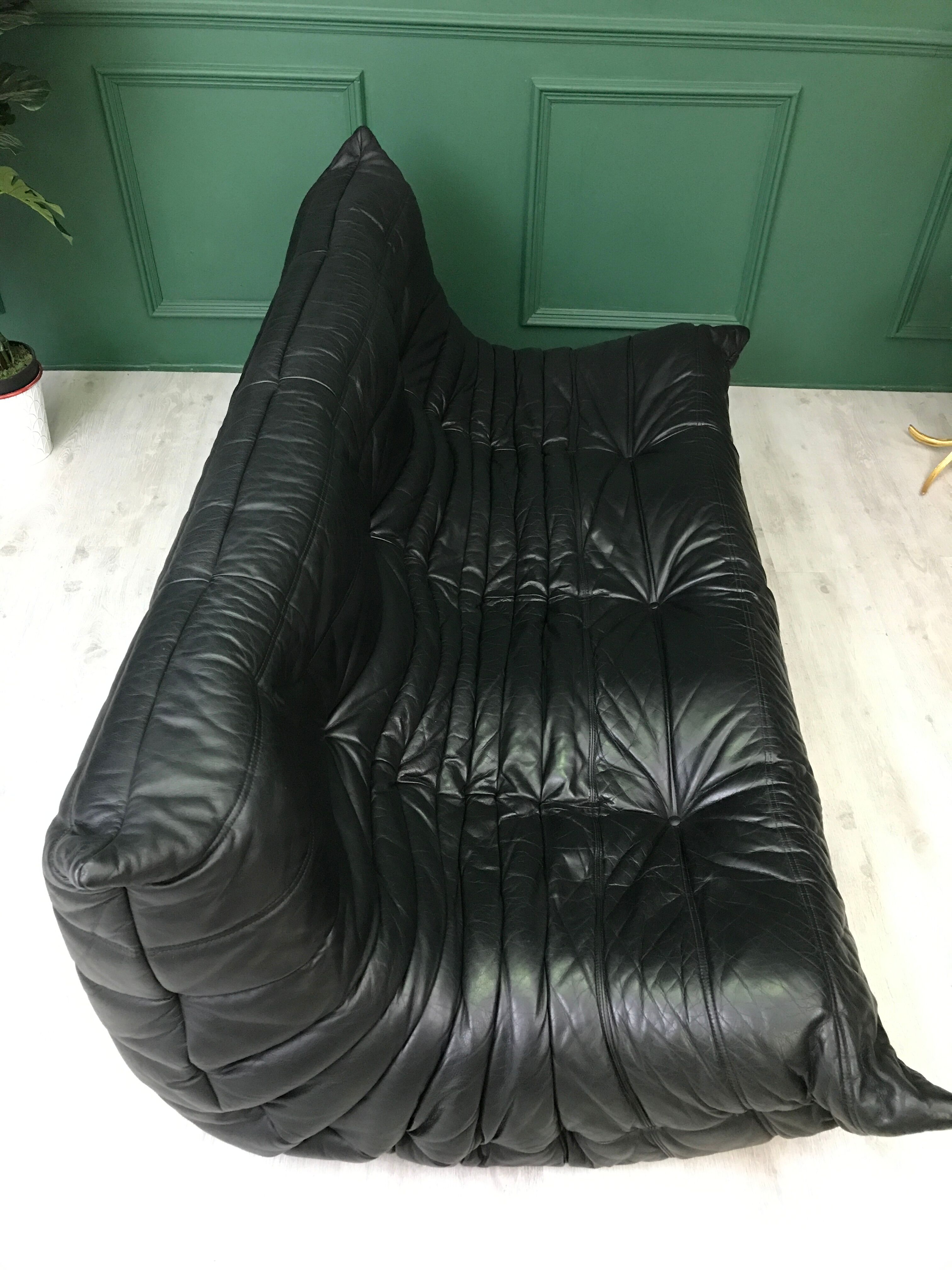 Black leather three seater sofa Togo by Ligne Roset