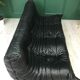 Black leather three seater sofa Togo by Ligne Roset