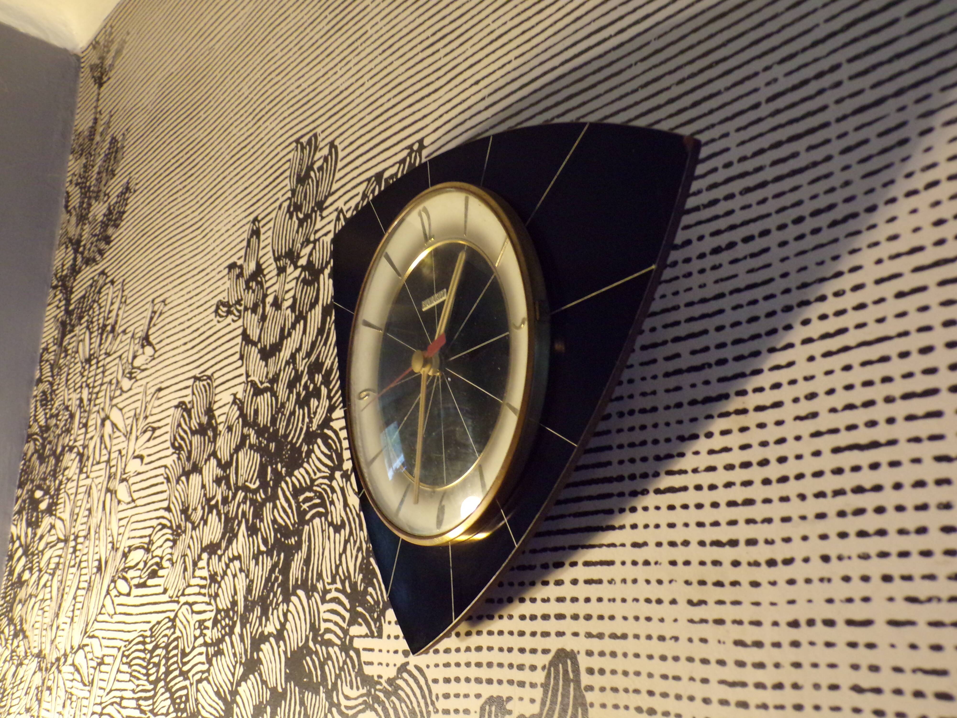Pendule murale vintage en formica