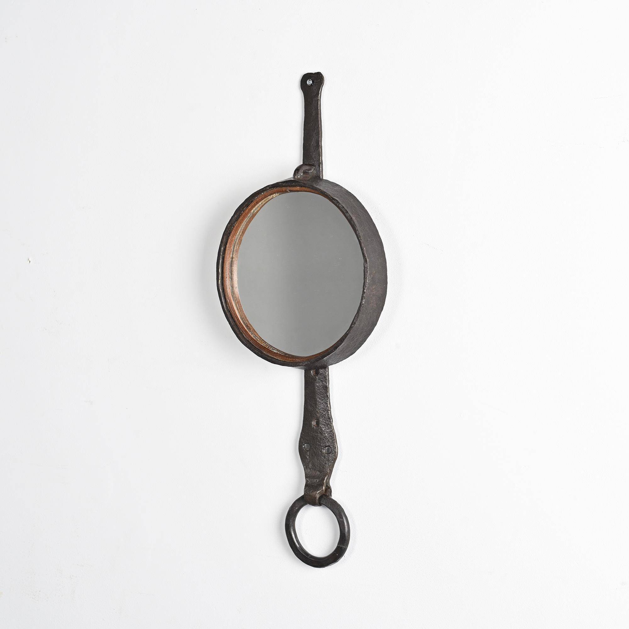 Wrought iron mirror by Léopold Gest, France, circa 1970.