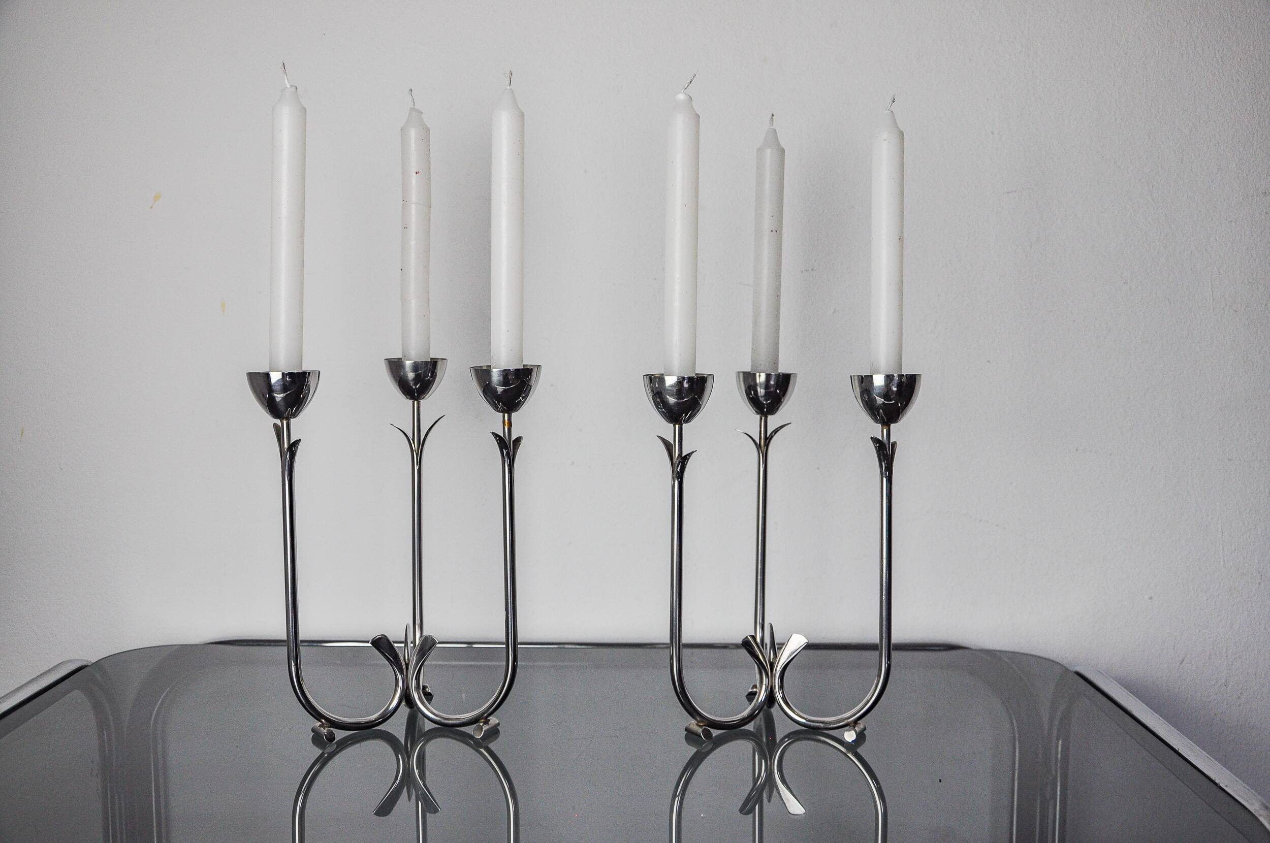 Pair of art deco stainless steel 3-flame candlesticks, Spain, 1970