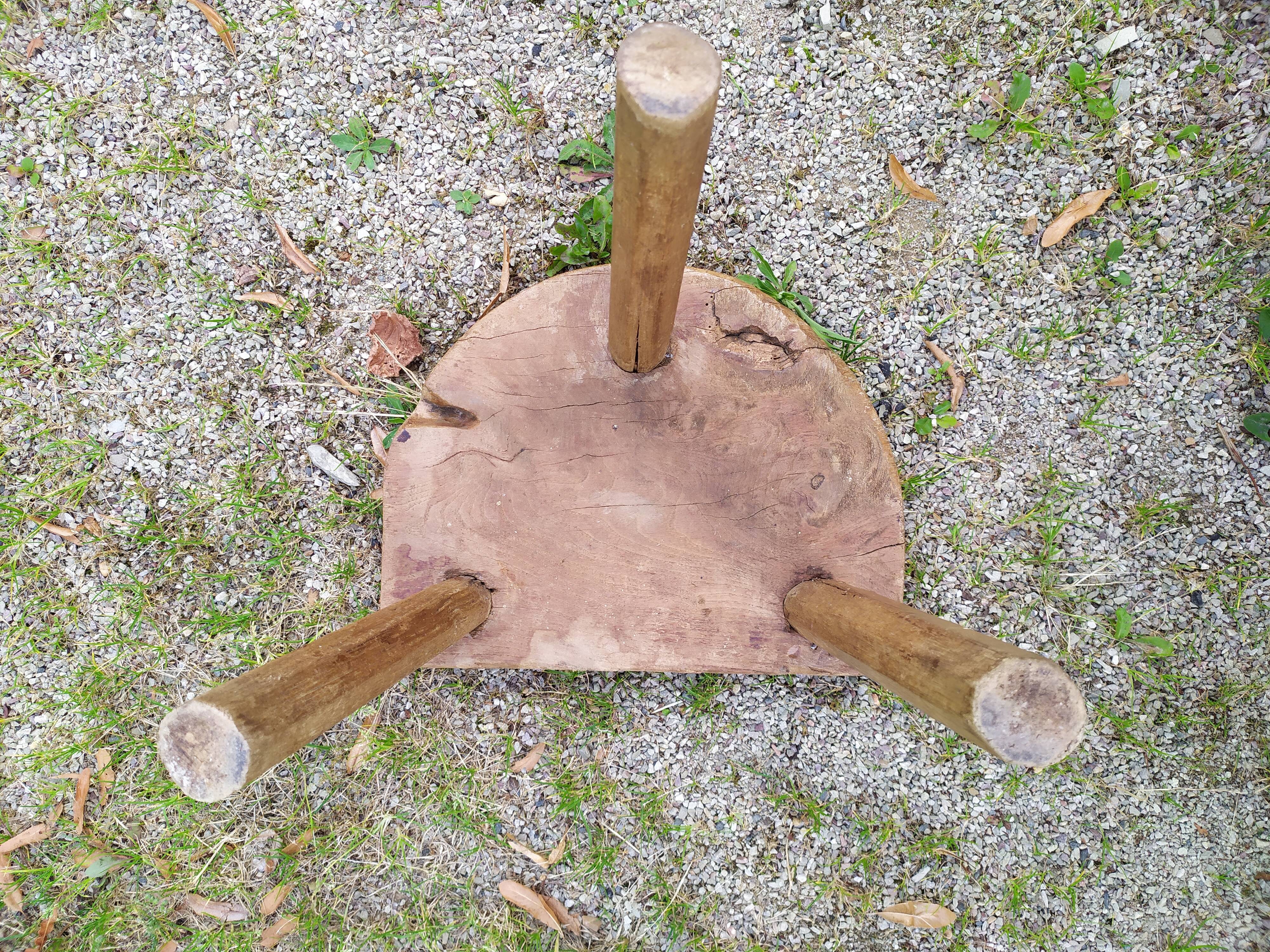 Tripod stool in raw wood