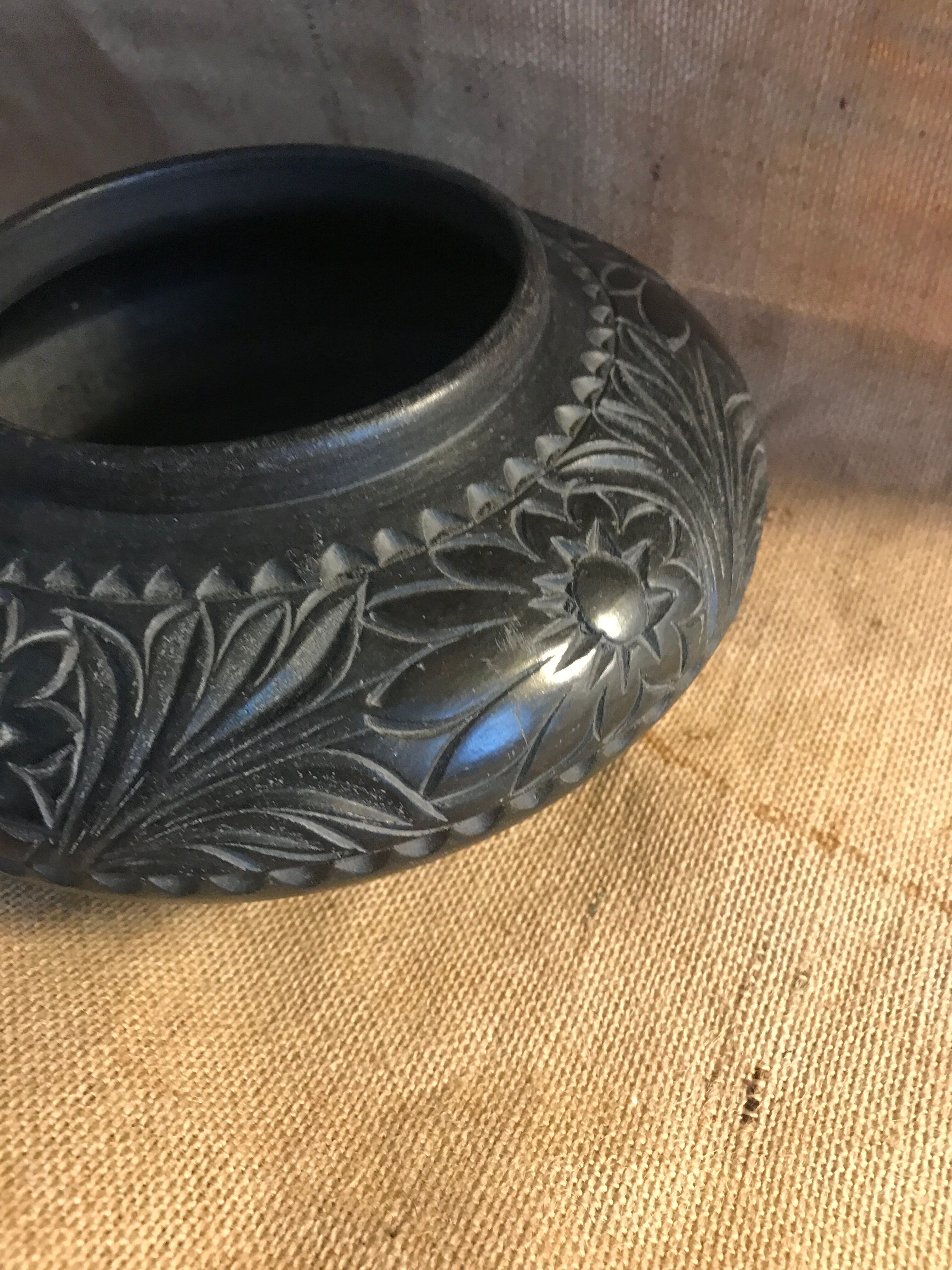 Engraved terracotta vase