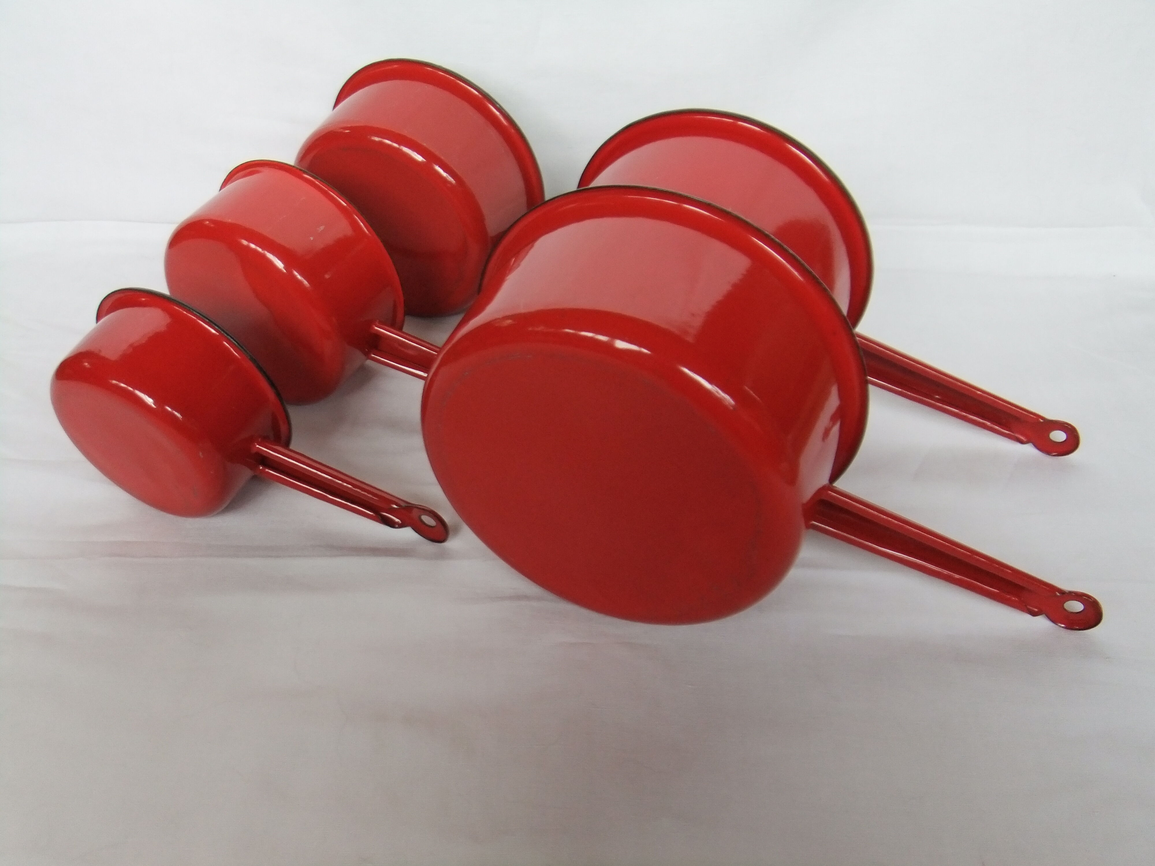 Red enamelled sheet metal pans