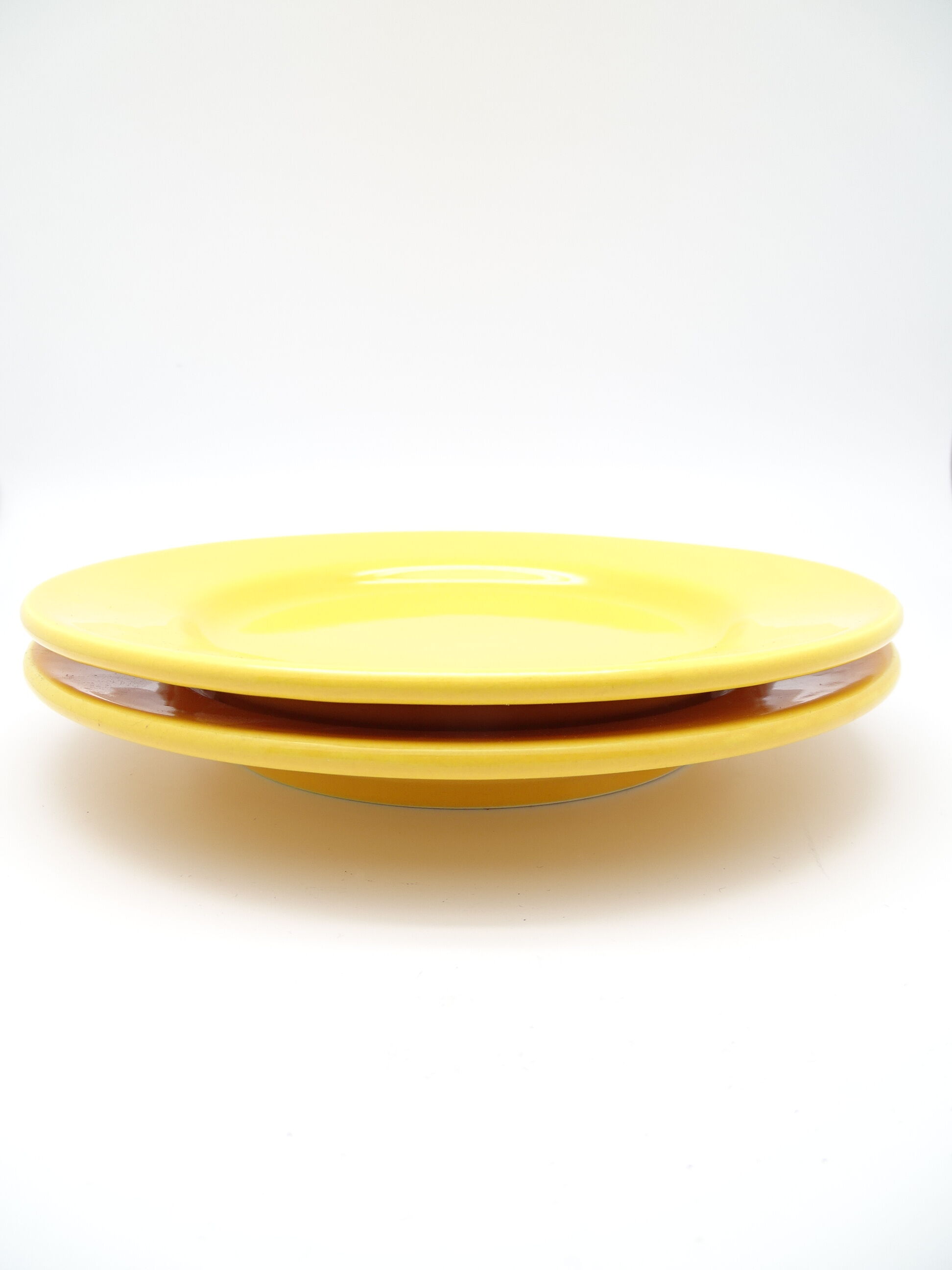 Set of 2 yellow ceramic plates