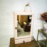 Pink bathroom cabinet