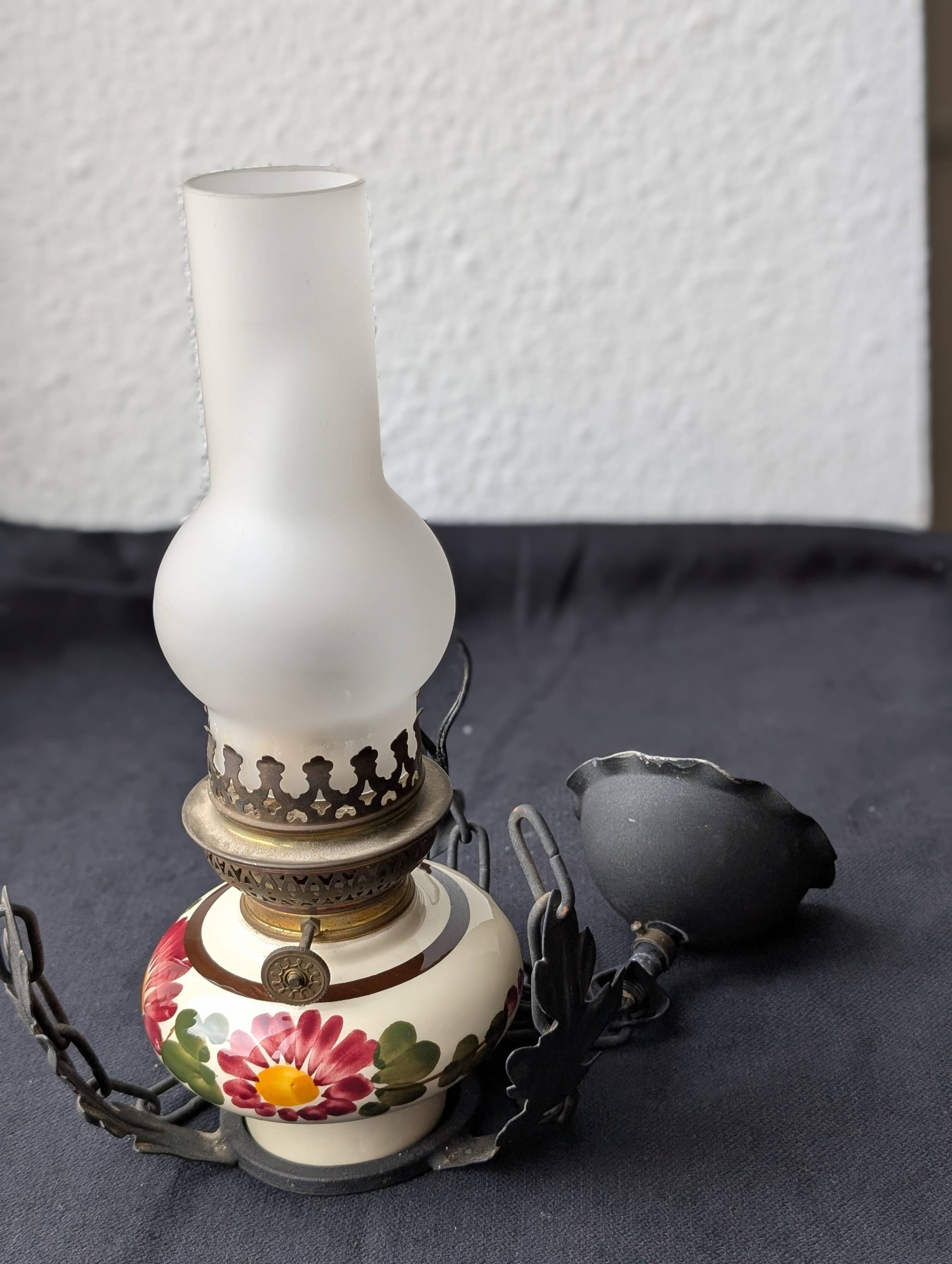 Vintage style suspension oil lamp.