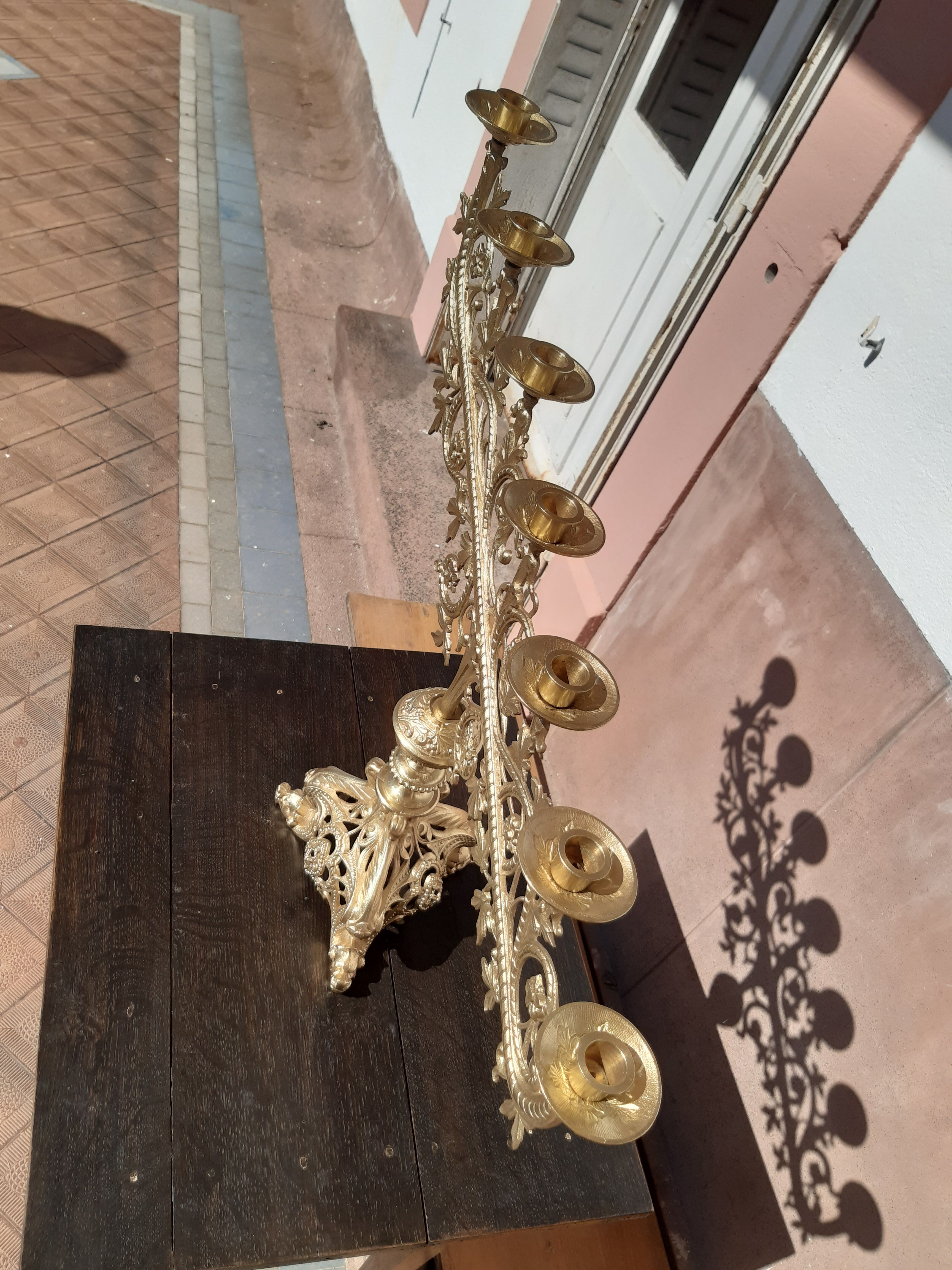 Antique candle holder in bronze and brass nineteenth century.