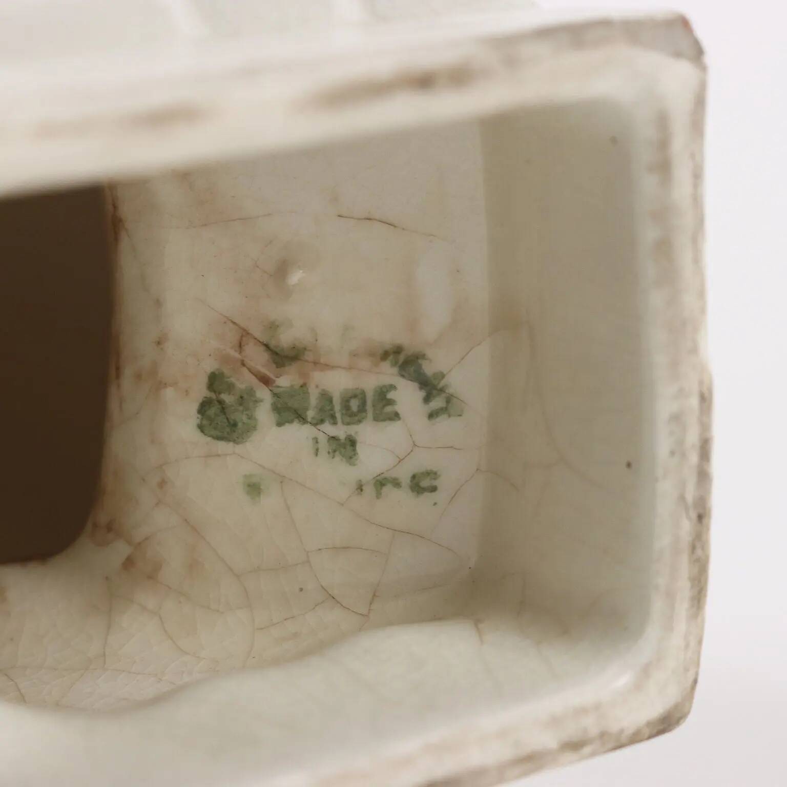 Ancient ceramic pigeon sculpture by George Ventrillon for Saint Clément.