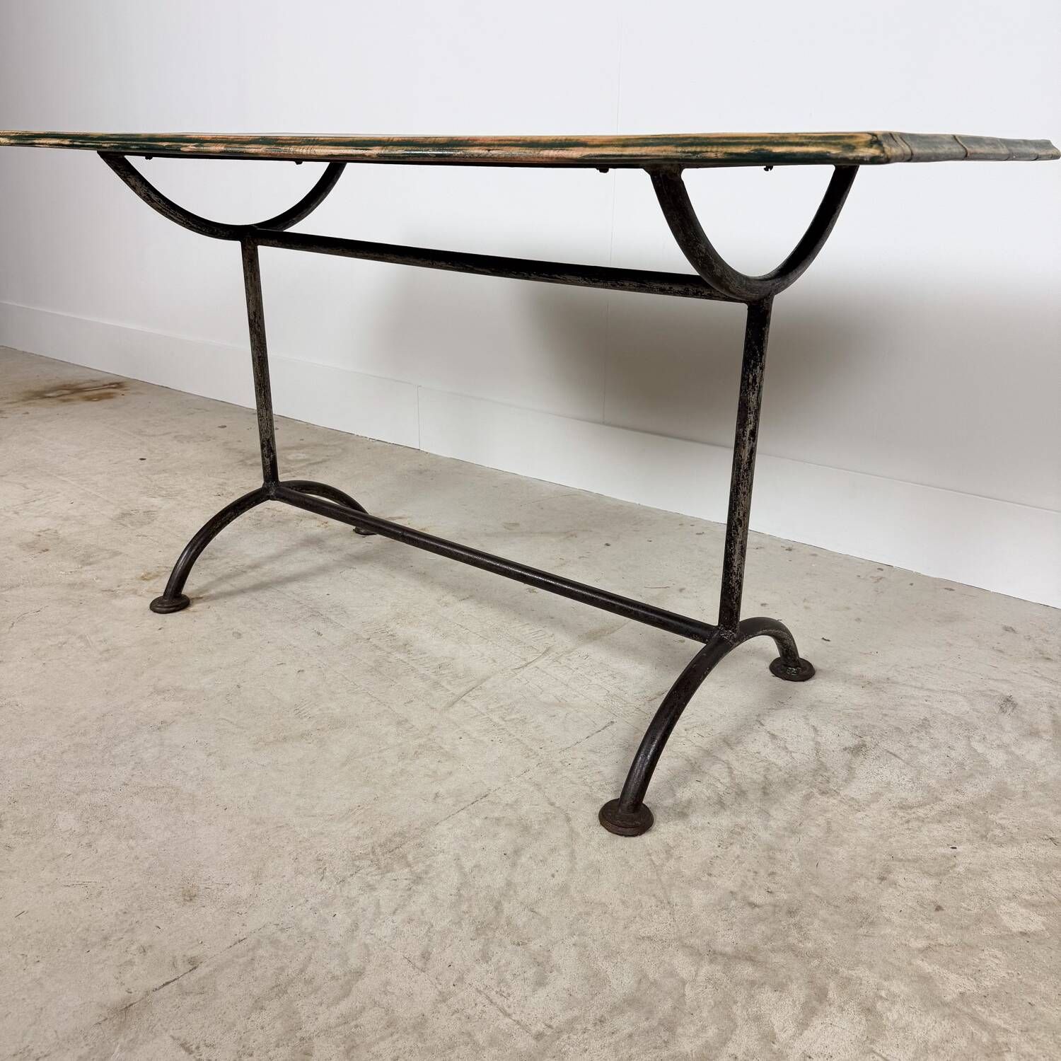 Vintage industrial bistro table with green painted wooden top