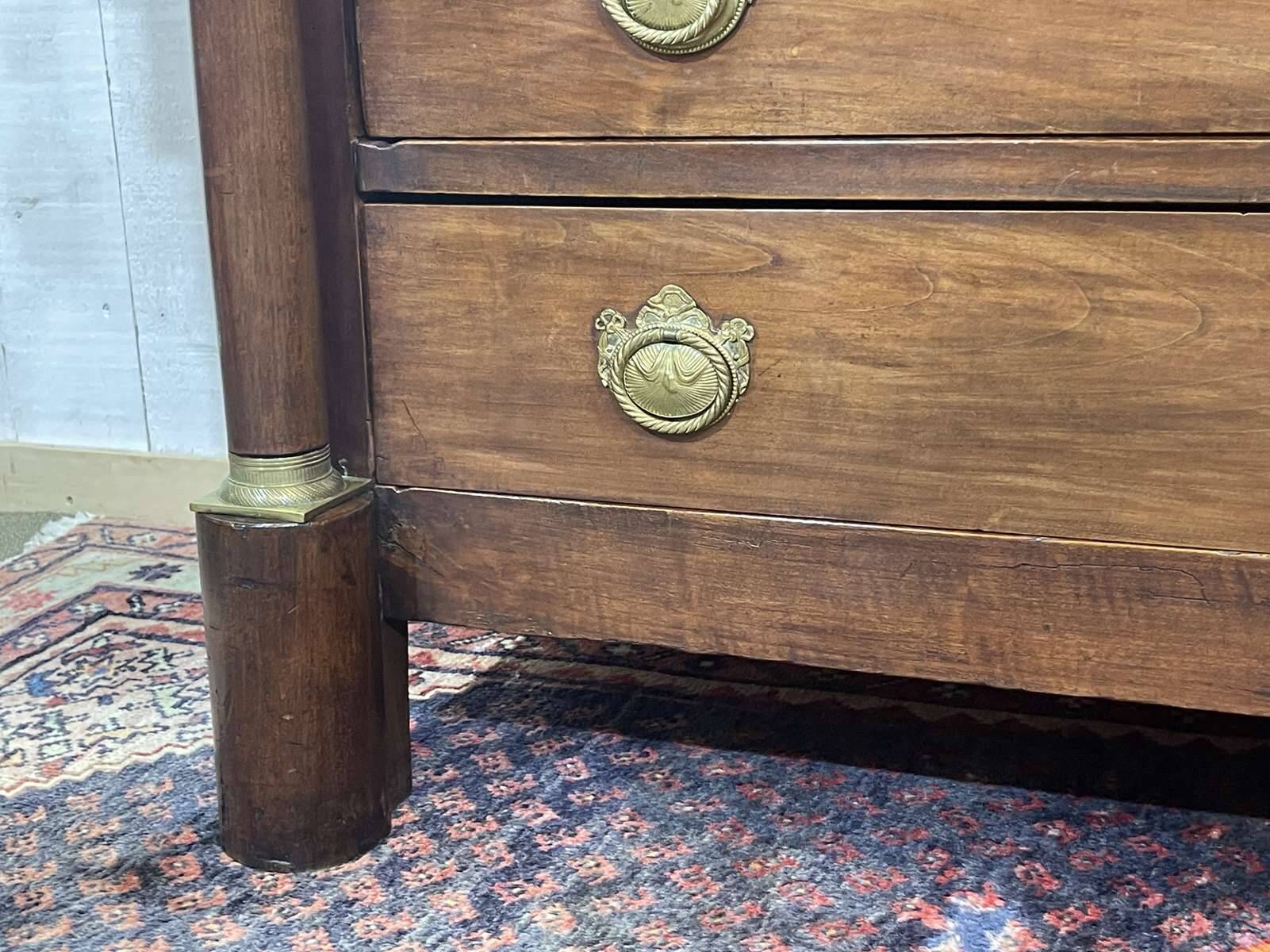 19th century Empire chest of drawers in cherry wood and black marble