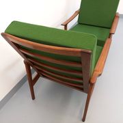 Pair of vintage Scandinavian armchairs in teak and green fabric from the 1960s.