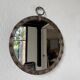 Brutalist round mirror with wrought iron and studs.
