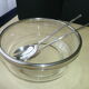Salad bowl and silver-plated cutlery