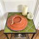 Decorative ceramic deep plate with fish decoration