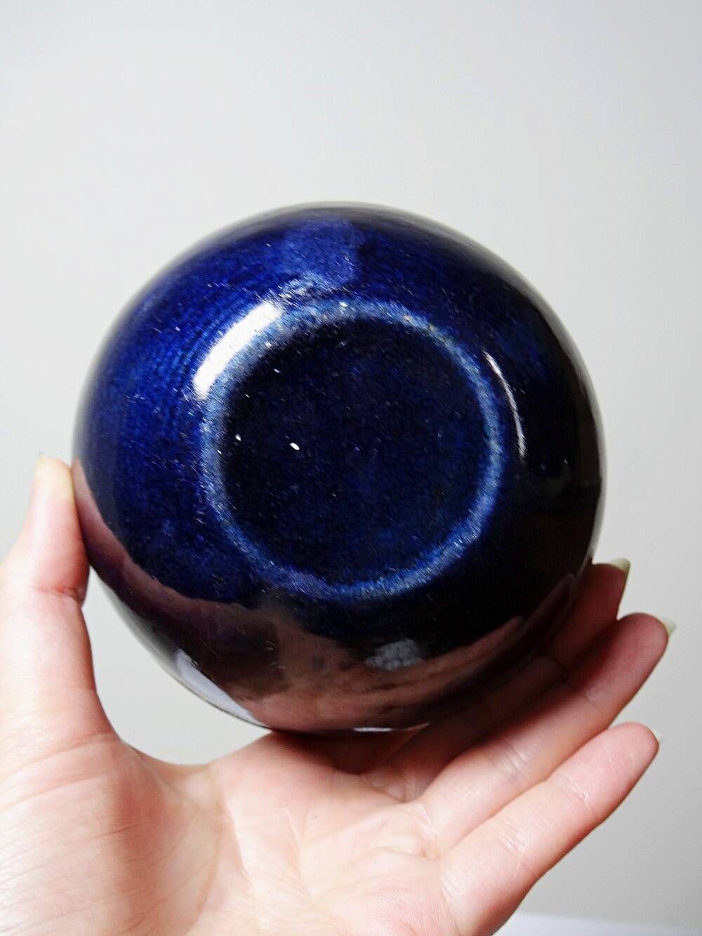Pair of vintage hand-crafted blue and copper enamelled bowls.