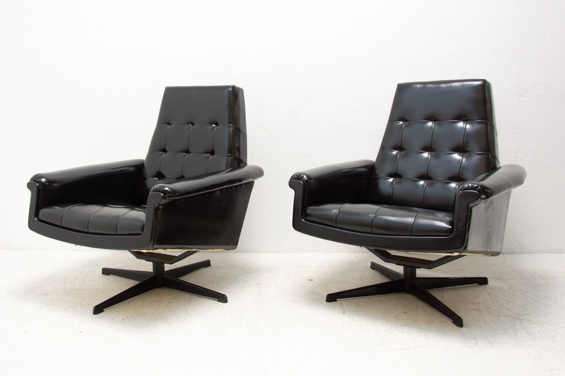 Pair of leather swivel armchairs from UP Zavody, 1970´s