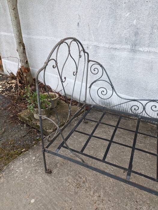 Metal folding bed, wrought iron bench