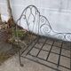 Metal folding bed, wrought iron bench