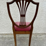 Set of 6 wooden chairs sitting red