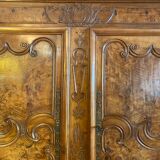 Wedding wardrobe of the Bressan country in walnut and walnut magnifying glass dated 1850