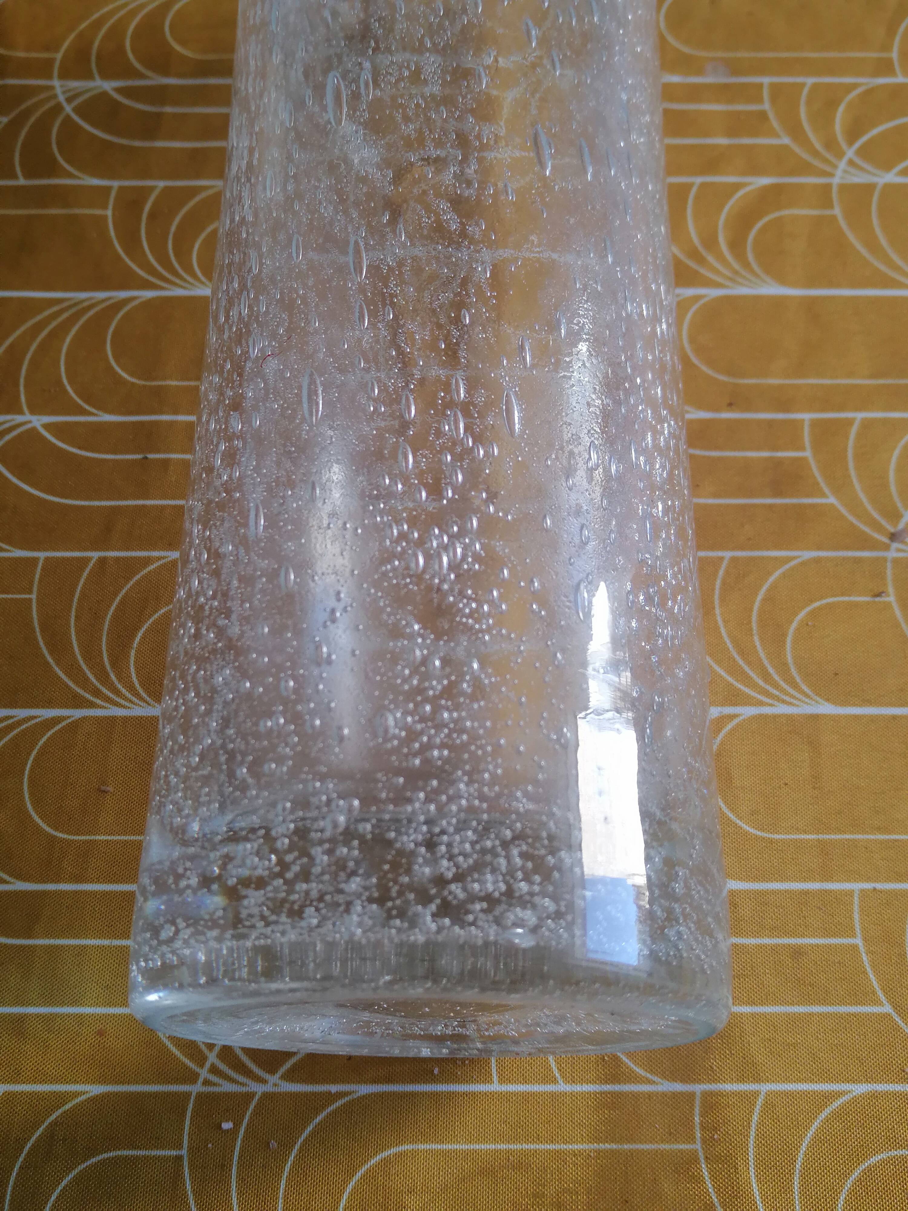 Old biot glass roller vase