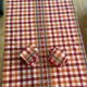 Checkered tablecloth and matching towels