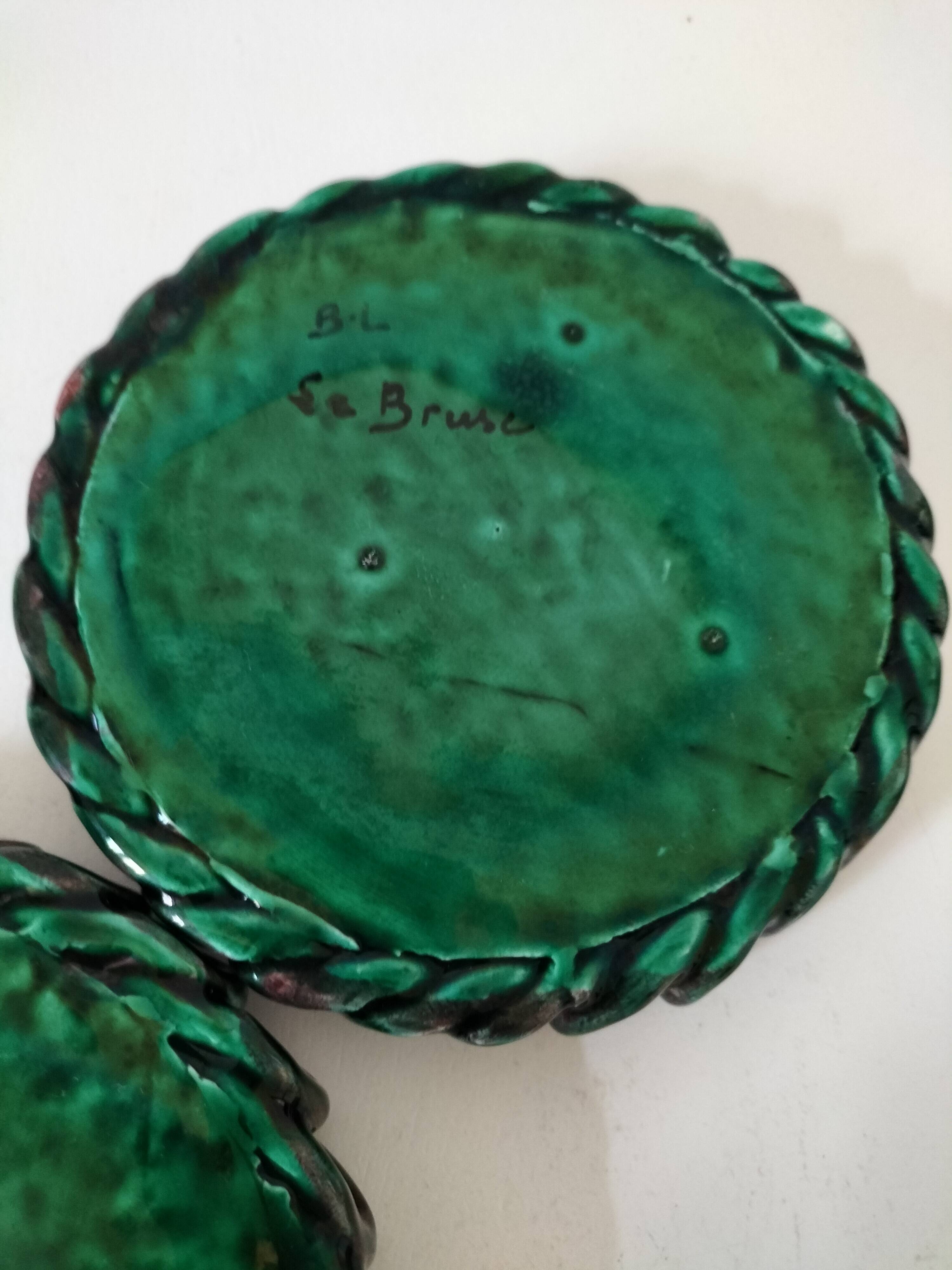 Pair of enamelled woven ceramic trinket trays signed BL, Le Brusc (Var)