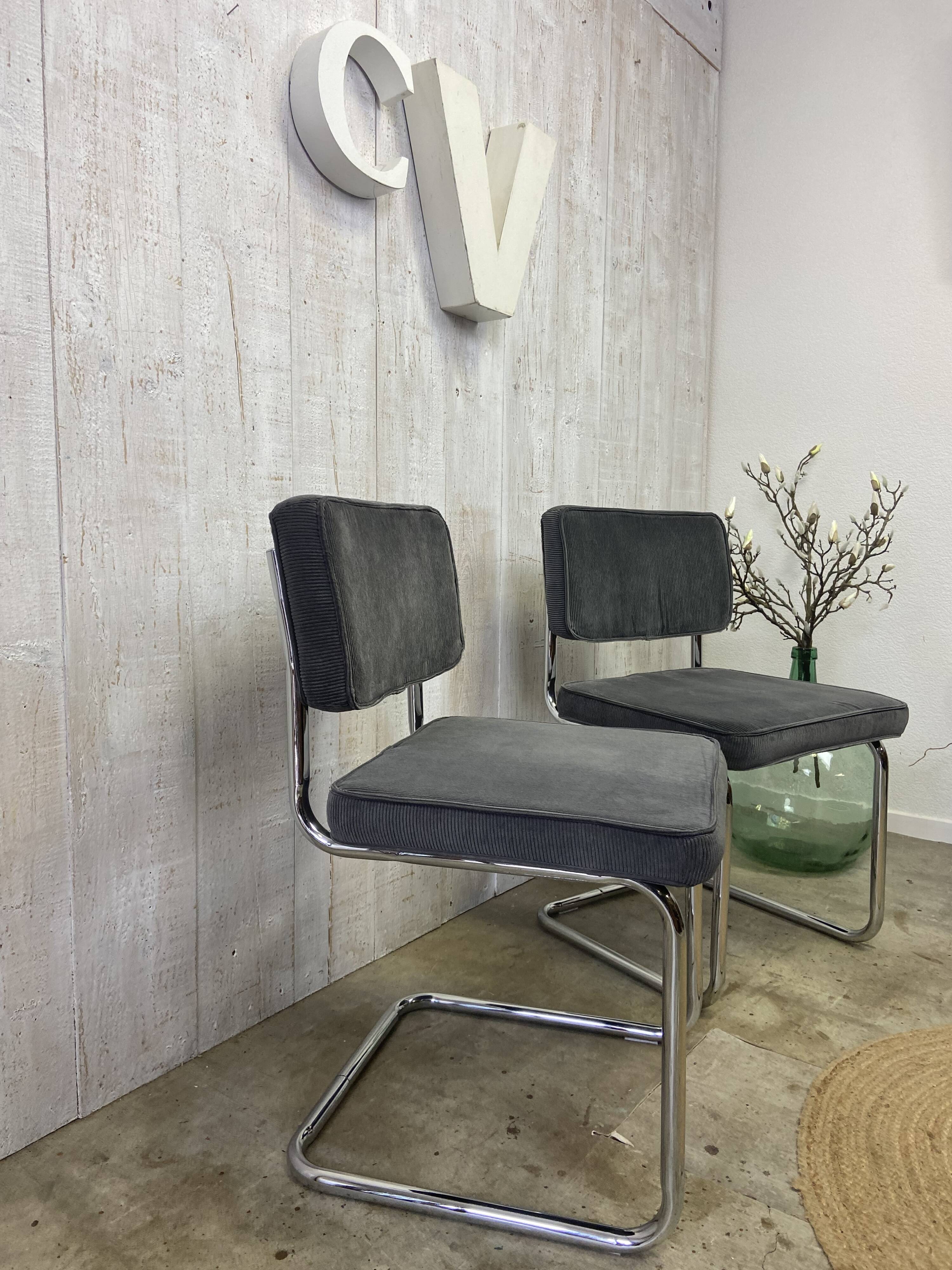 Pair of chrome and velvet chairs