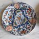 Assiette de Delft, décor "Le Paon" 23 cm