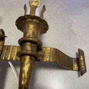 Spanish brutalist wall light in gilded wrought iron.