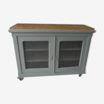 Vintage buffet on grey green wheels, 2 glass doors, wooden tray.