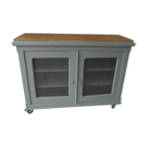 Vintage buffet on grey green wheels, 2 glass doors, wooden tray.