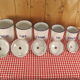 6 old spice pots in white and blue enamelled sheet metal