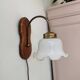 Vintage wall lamp with 70s glass cap