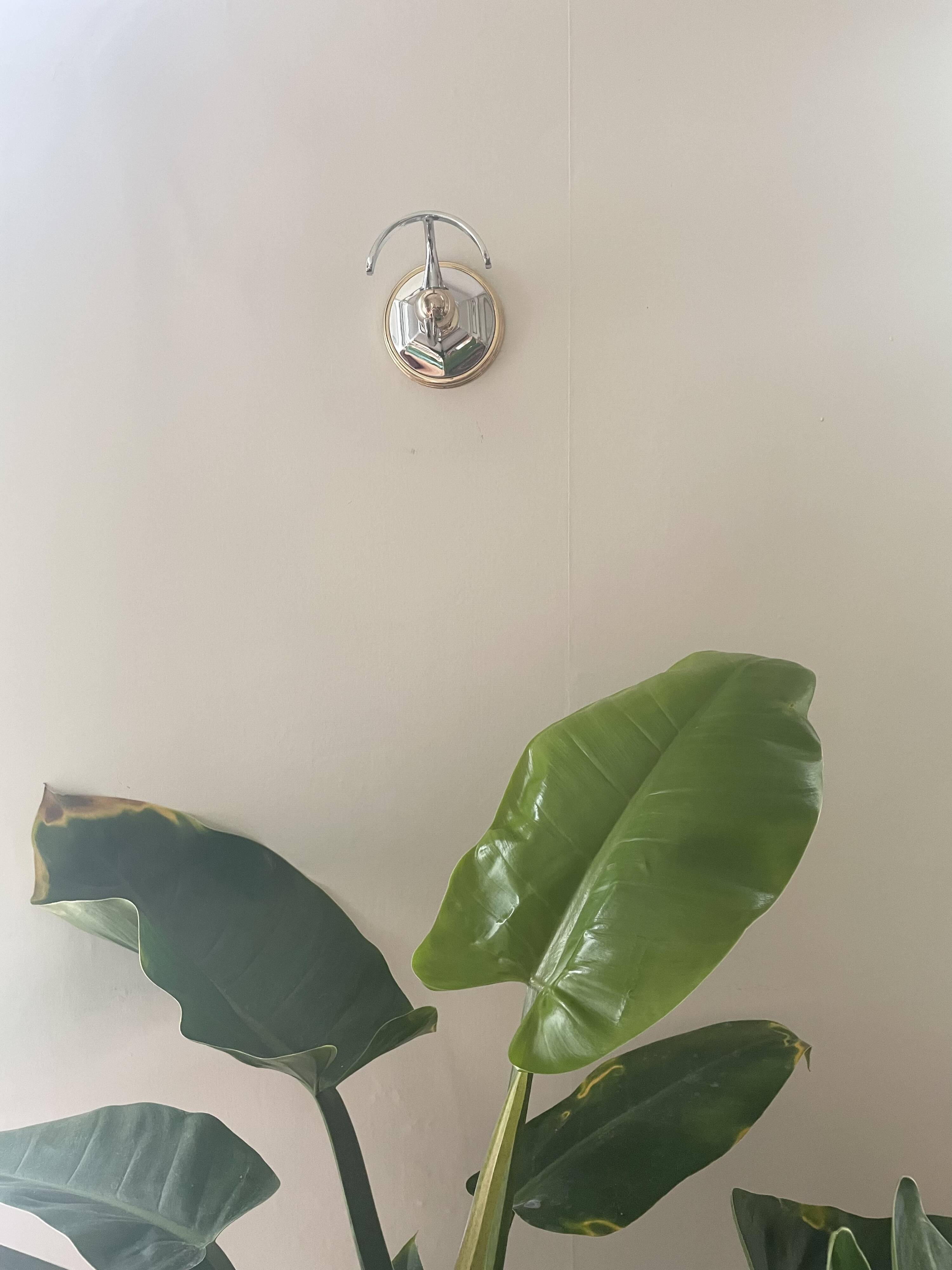 Chrome and gold metal coat rack